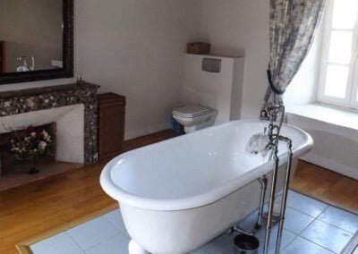 France Fortified Farm House: Bathroom with free standing bath in the middle of the room