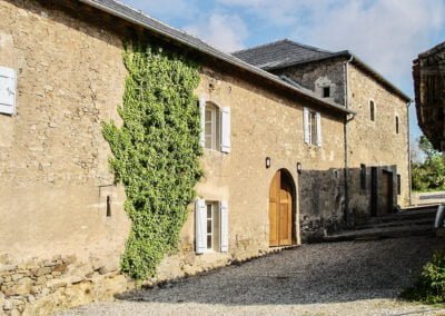 France Fortified Farm House: Side of the barn and path